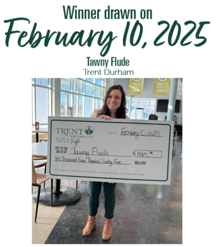 Employee holding large cheque