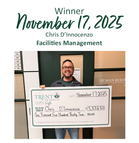 Lottery winner Chris D'Innocenzo holding his cheque