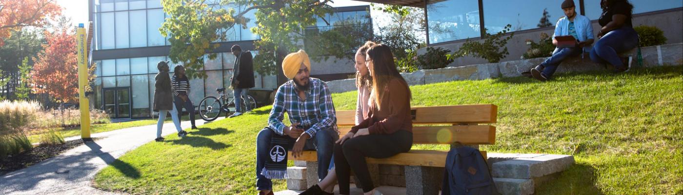 Student Discussion Outside Bata Library