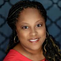 person with dark skin and hair wearing a red shirt against a blue background