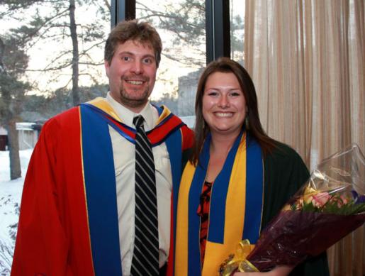 Ashley Robinson, outgoing Prime Minister of LEC Cabinet with Principal Michael Eamon