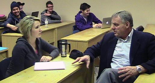 Mr. David Paterson, new community leader of the Trent Business Council works with Trent University Business students