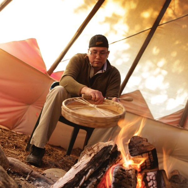 A firekeeper in the tipi
