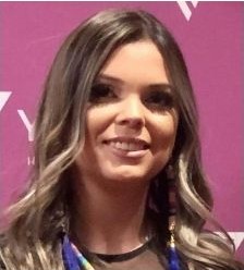 Smiling woman with wavy hair