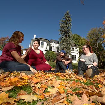 Catherine Parr Traill College with students standing outside