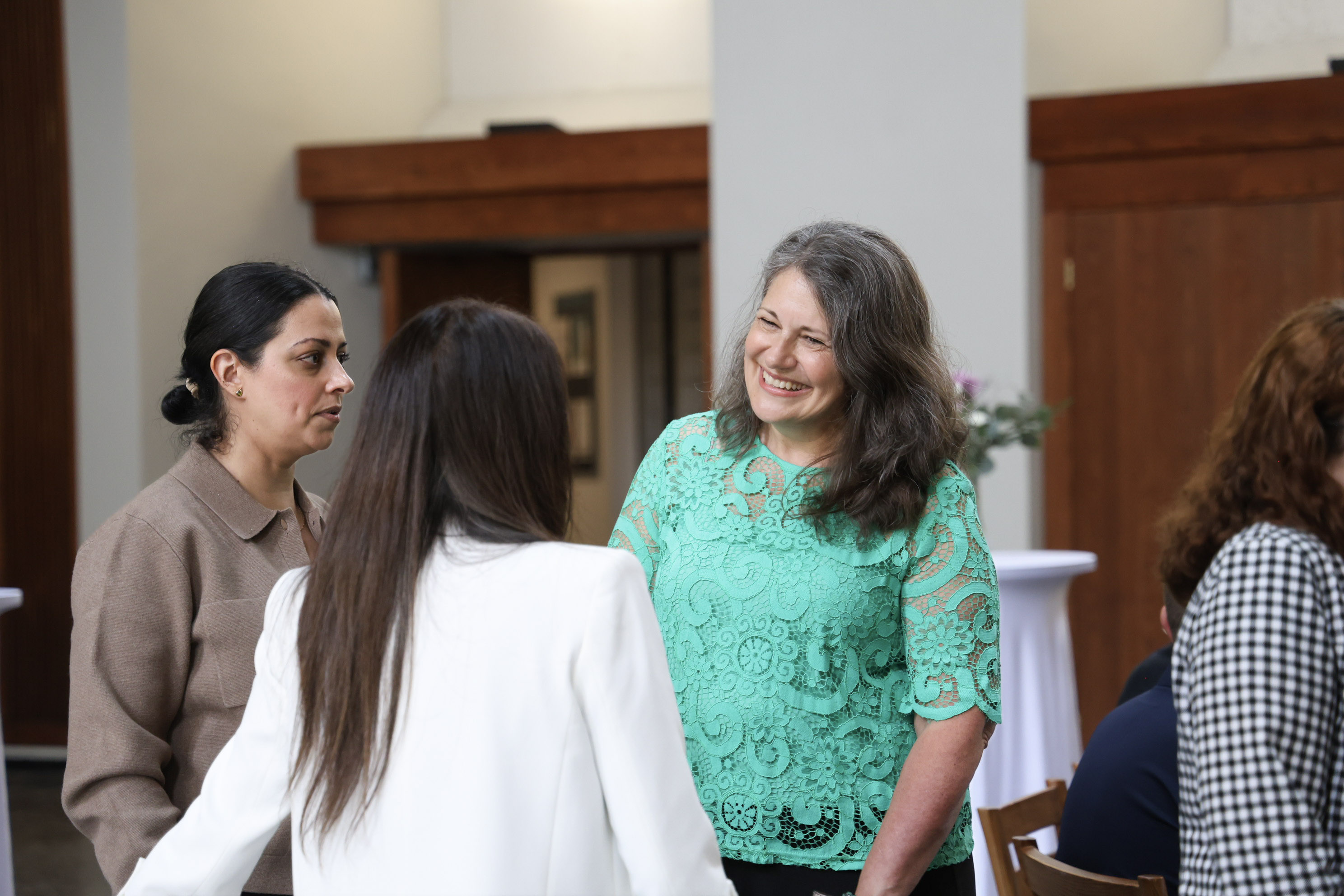Julie talking with people