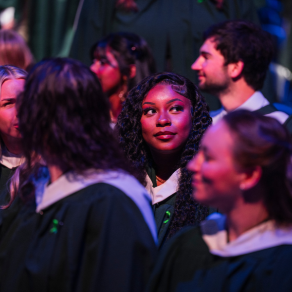 Student looks off in wonder during convocation