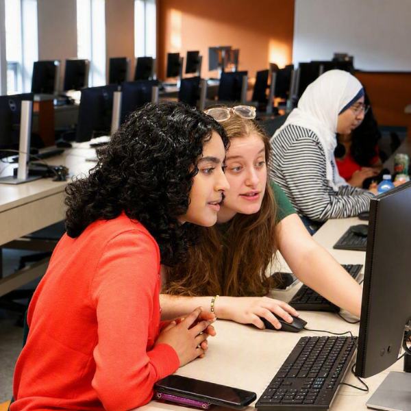 Students working together on a computer