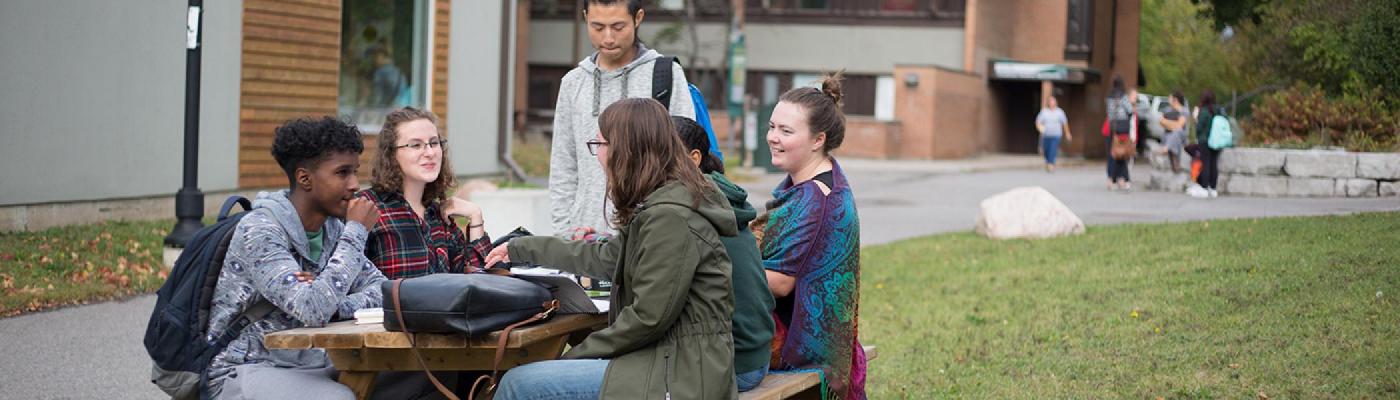 students around picnic table