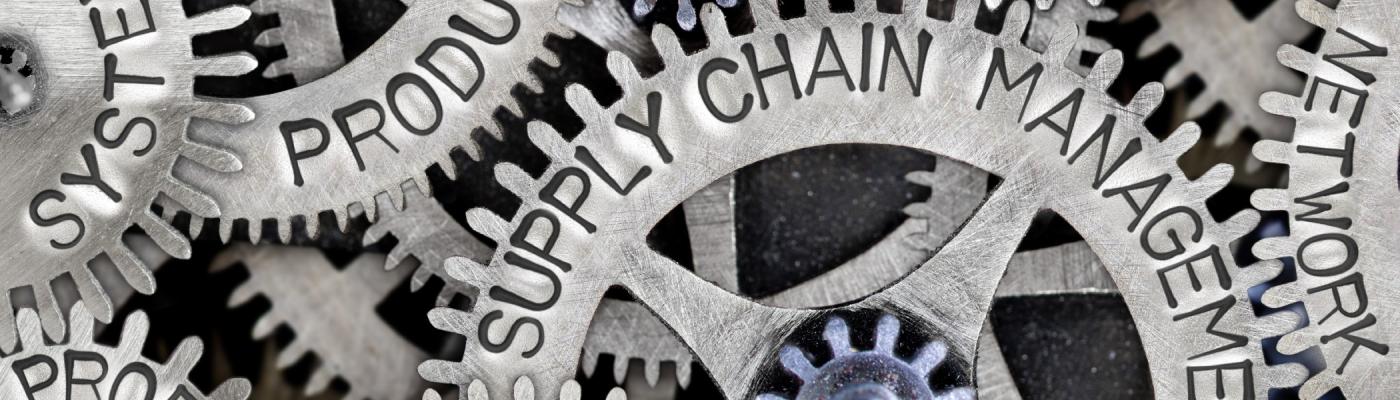 A series of gears with Supply Chain Management engraved on them.