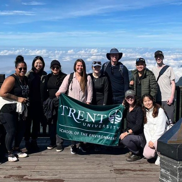IESS Students posing with a flag