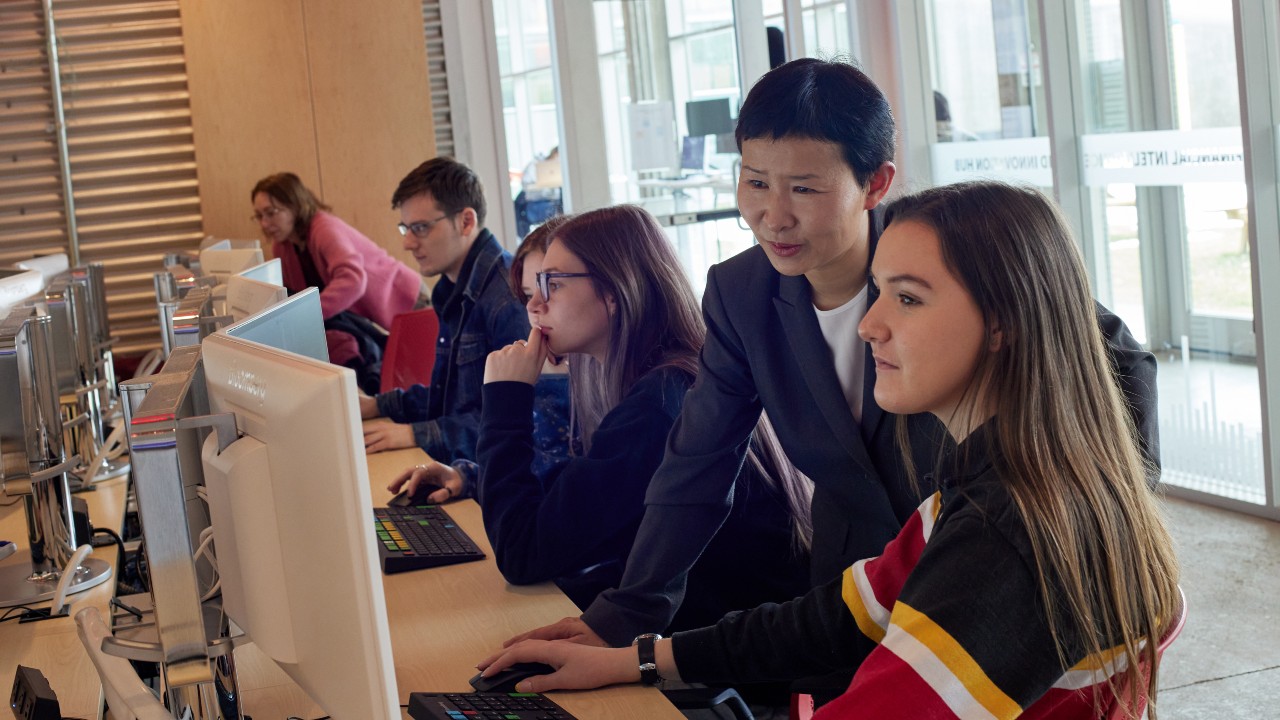 A professor working with a student