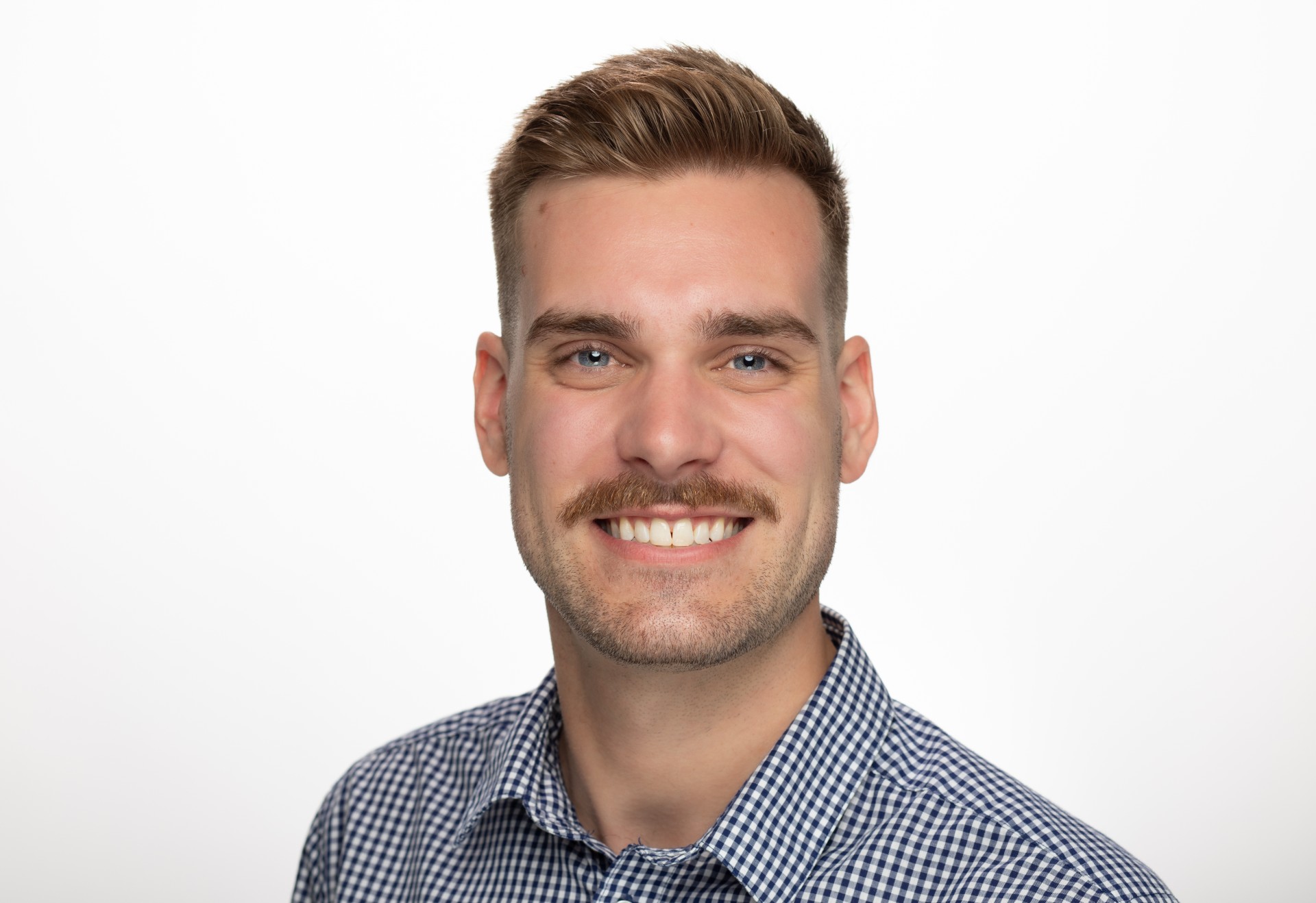 headshot of male alumni student