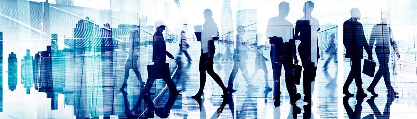 stylized photo of people walking through a lobby