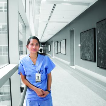 Nurse in Blue Scrubs