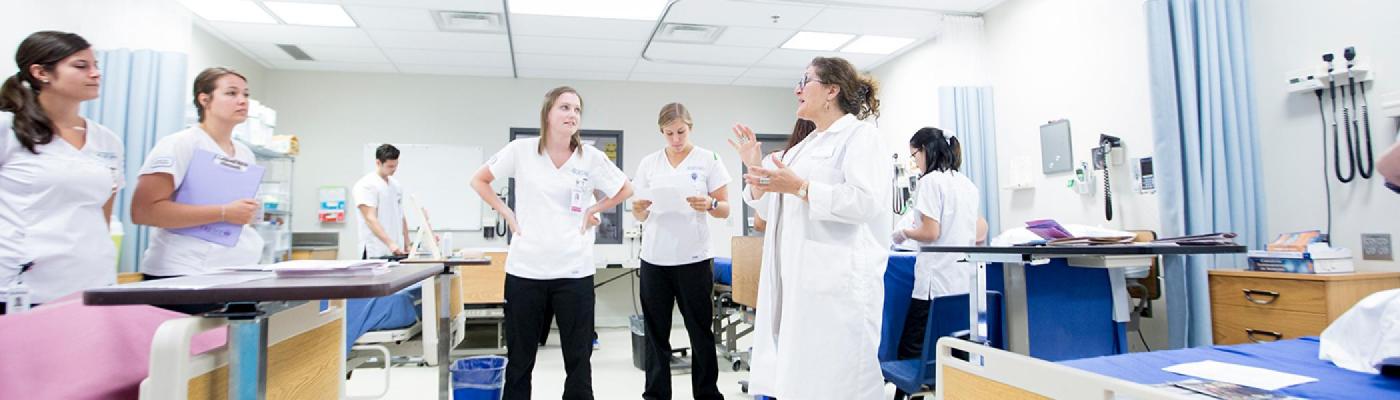 Trent faculty and students in Nursing program in their lab 