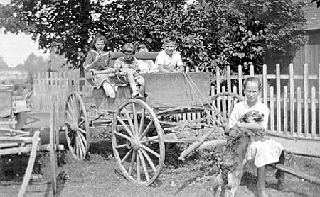 Marjorie with dog and wagon