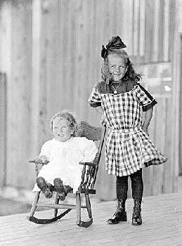 sisters- Marjorie in rocking chair