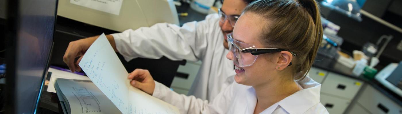 Two students working in the lab