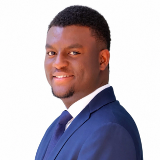 Photo of Richard Nonso smiling in a blue suit