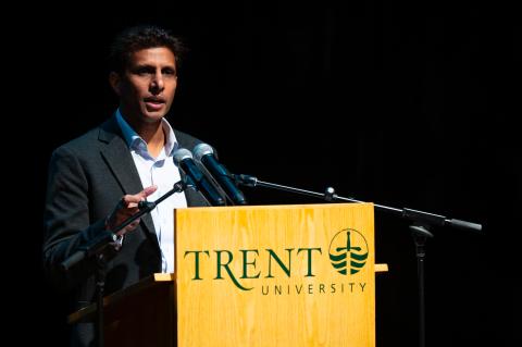 a person talking on a podium