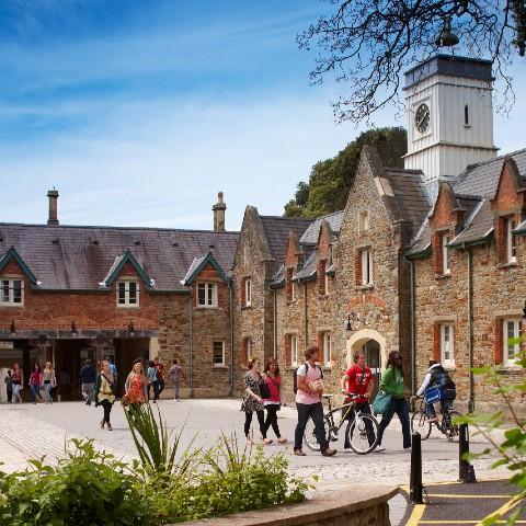 Students walking on the Swansea University campus in Wales