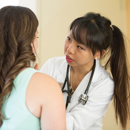 Doctor seeing patient