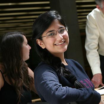 President Groarke interacting with students in the library