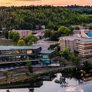 Exterior view of the Trent Student Centre and Bata Library at Sunset