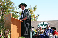 Dr. Franklin standing at the podium during his installation ceremony