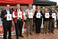 Dr. Franklin standing with colleagues at a Trent University United Way fundraiser at the Bata library