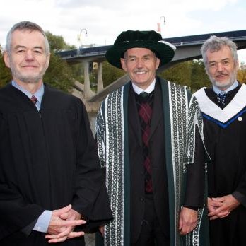 Dr. Leo Groarke with his triplet brothers Louis and Paul.