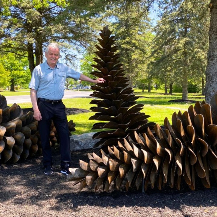 Photo of Leo with Pinecones