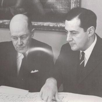 THB Symons reviewing a document.