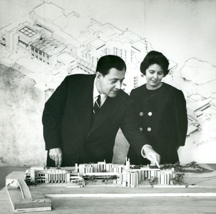 Tom B.H. Symons looking over model 