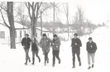 Tom H.B. Symons running with group in 'Hike for Hundreds' event