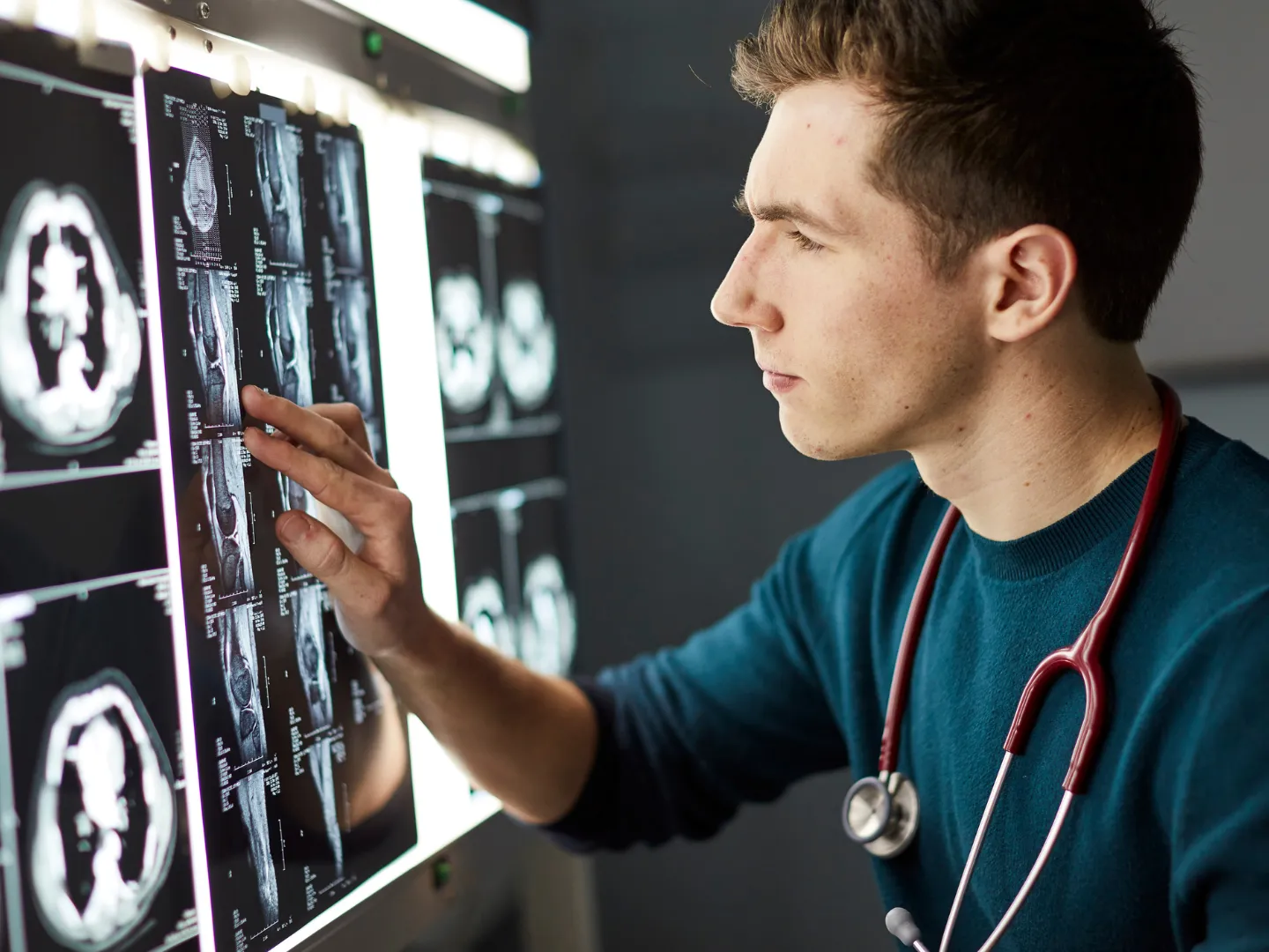 Student looking at brain scans