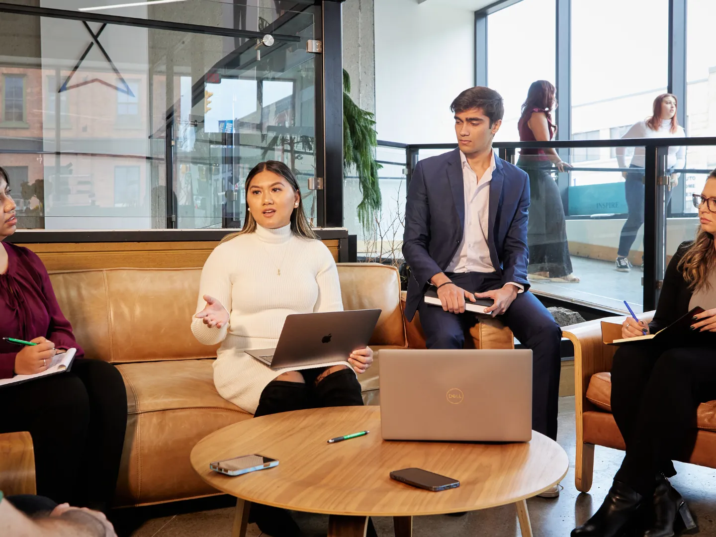 Students talking in business meeting