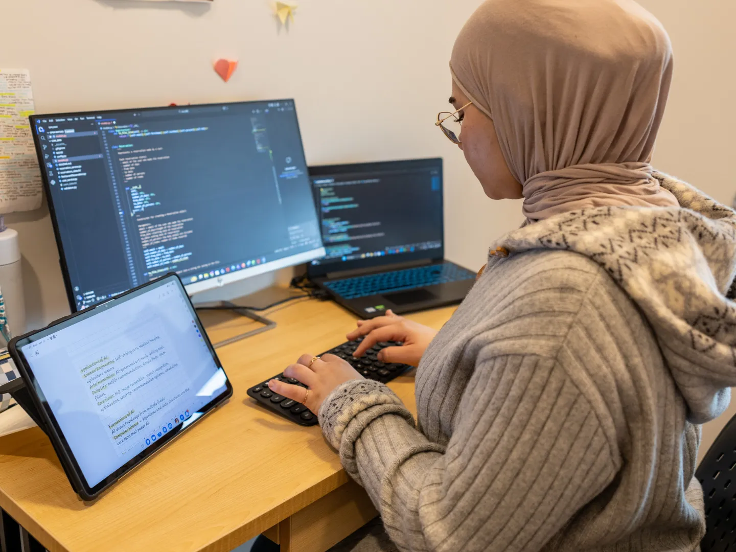 Student working on code in dorm.