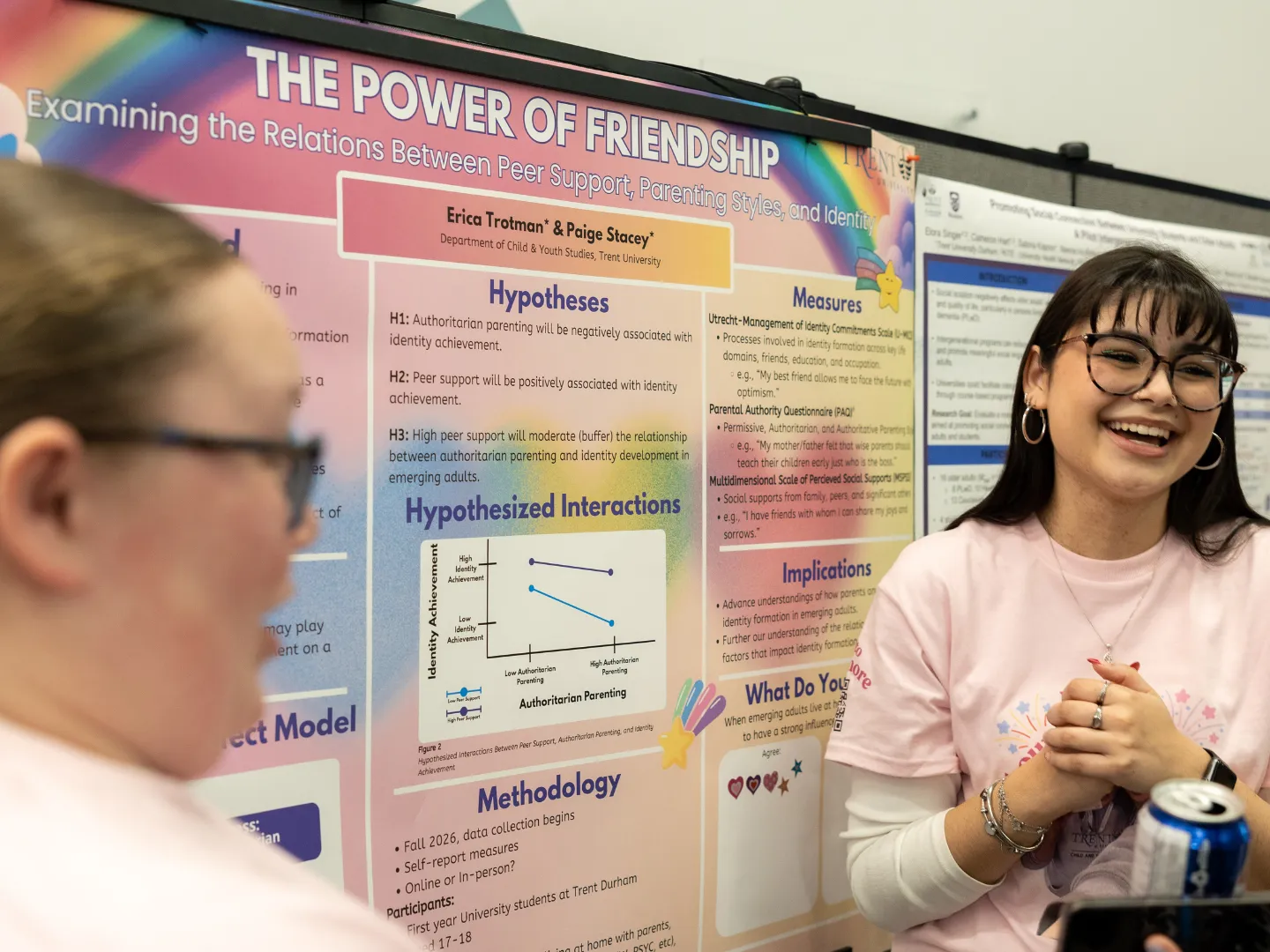 Student talking about their research poster.