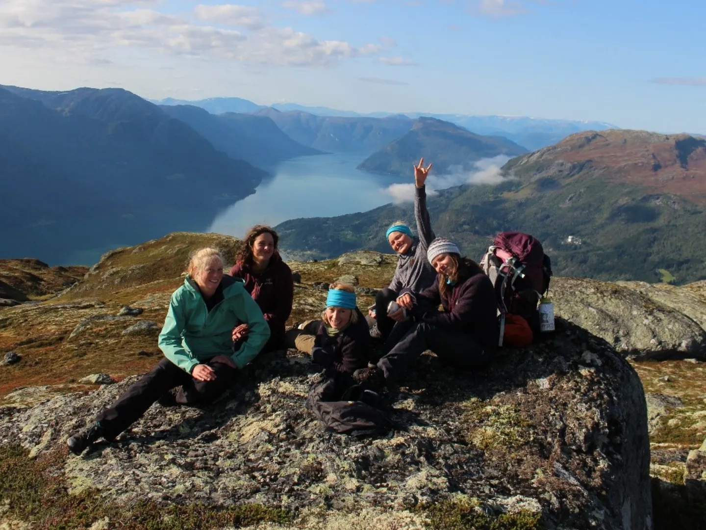 Group of students on mountain for study aboard trip.