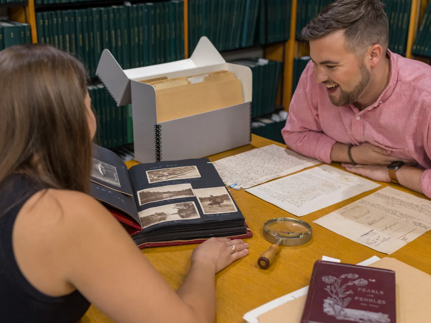 Students doing research in Trent University's archives.
