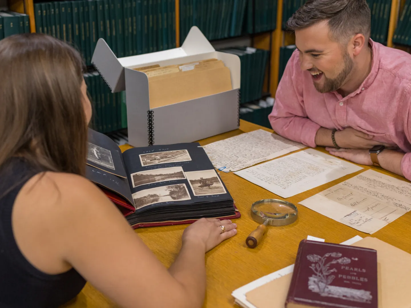 Students doing research in Trent University's archives.