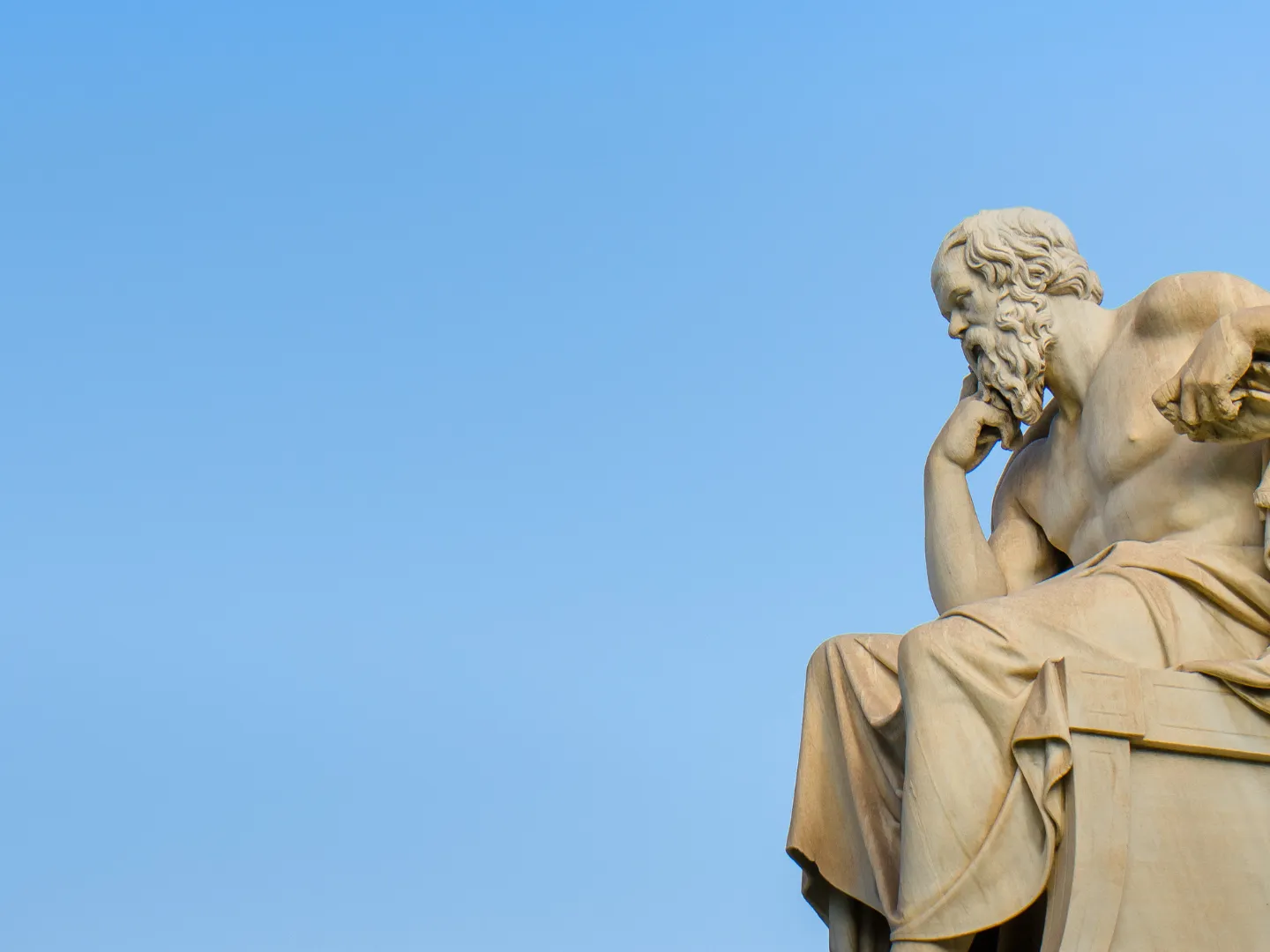 Marble statue of the ancient Greek philosopher Socrates located outside the Academy of Athens in Greece.