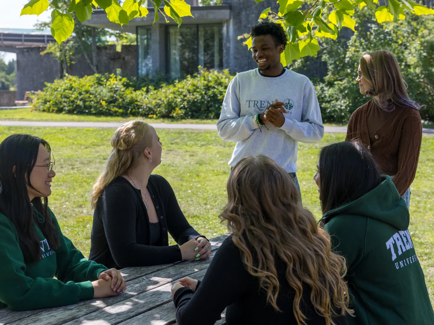 Group of students talking outside.