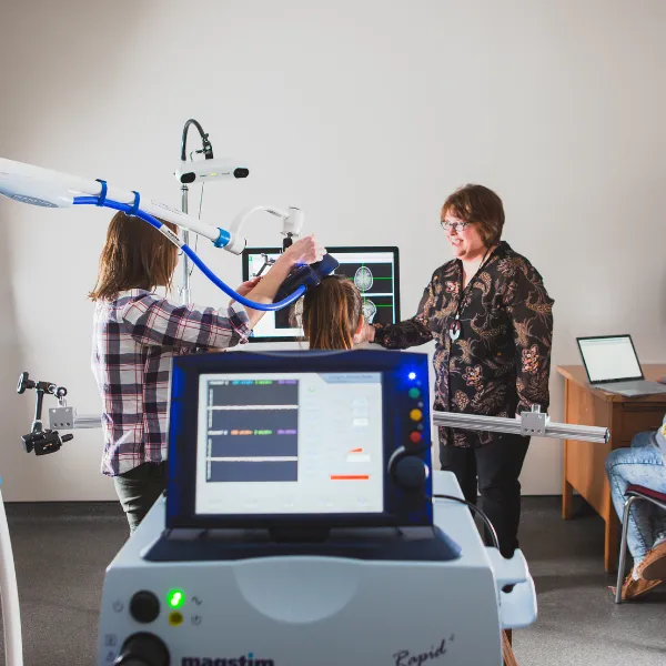 Psychology professors in neuroscience lab.