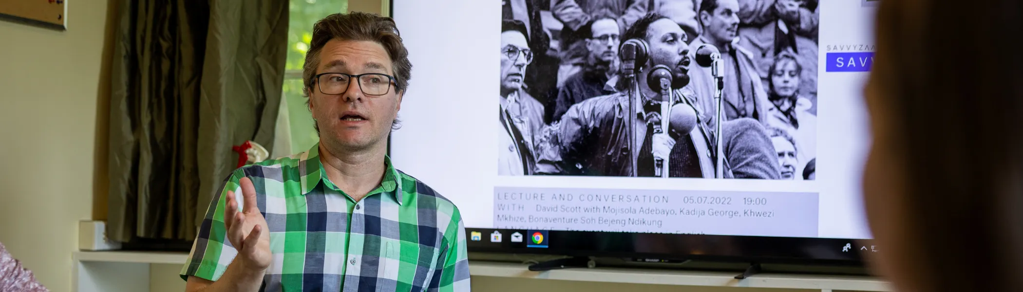 Professor lecturing students in seminar.