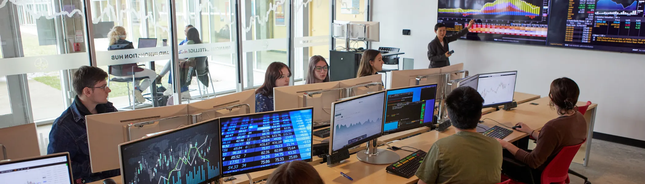 Trent University student and professor in Financial Intelligence & Innovation Hub for a seminar.