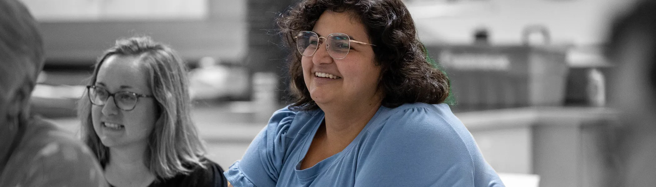 Trent University students in seminar, listening to professor.