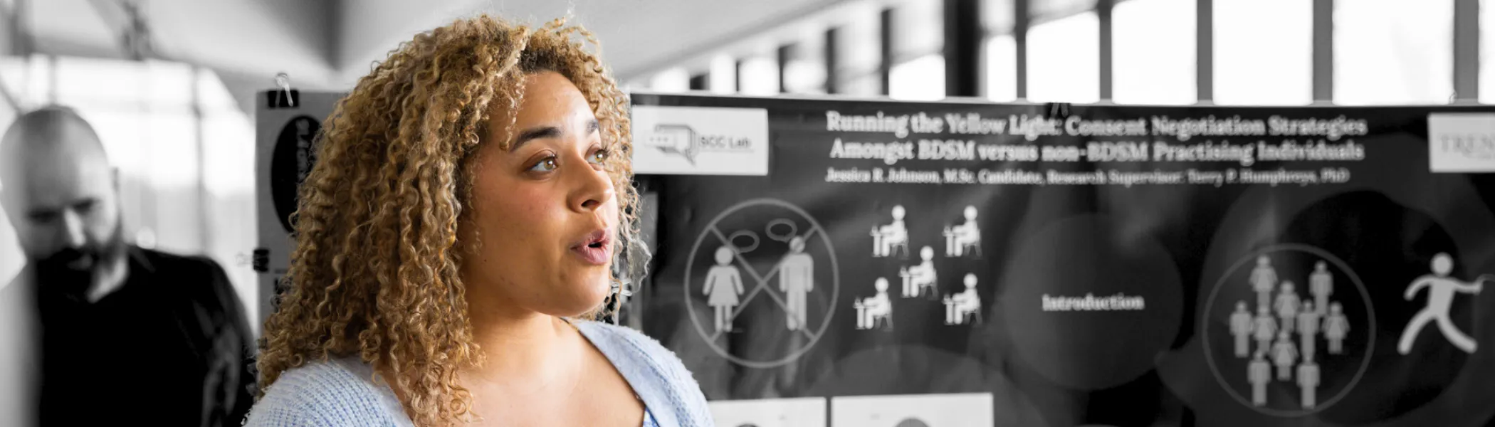 Trent University student giving a presentation about their research.